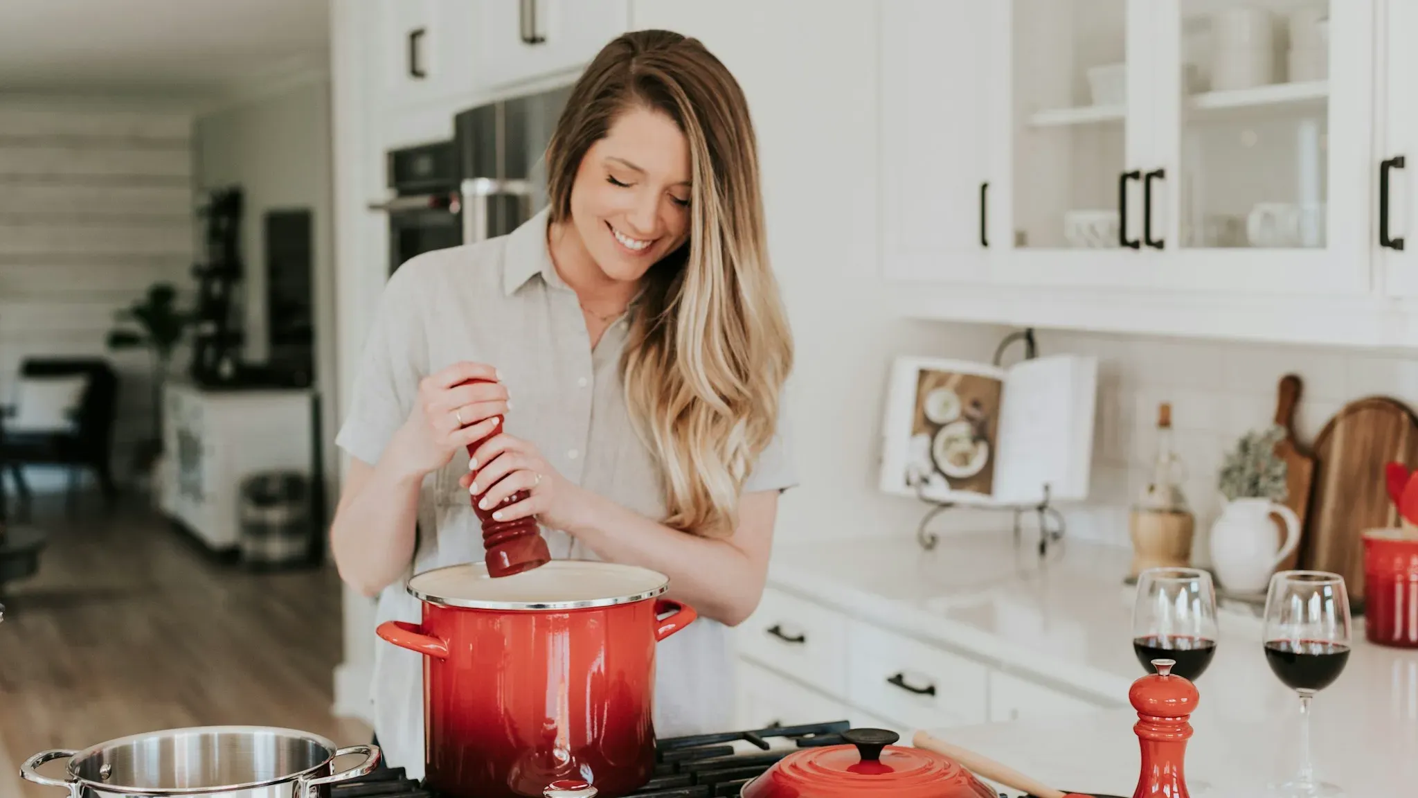Modern kitchen with a white sink installed in countertops with natural light